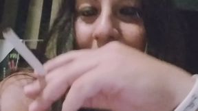 Smoking and drinking in a dark goth mode