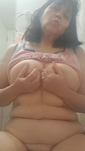 MILF pees and you squeeze her tits, it turns her on