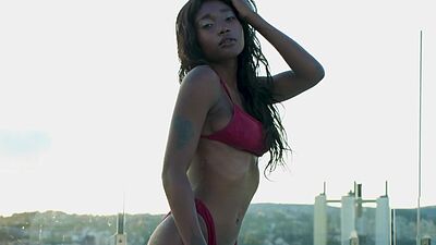 Petite black teen model Mimi Desuka posed outdoor and showed hoy wet body