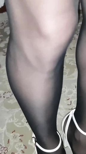 Dani on Bed in Black Pantyhose Showing off Curvy Legs and Ass