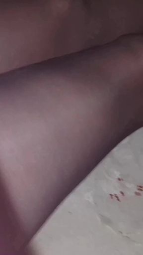 Dani on Bed in Black Pantyhose Showing off Curvy Legs and Ass