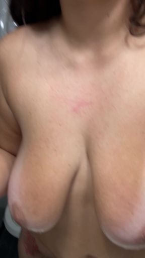 Amateur with big tits shows off her round ass