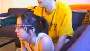 Nerdy brunette slut gets fucked from behind while playing videogame