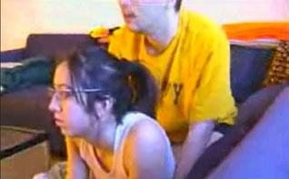 Nerdy brunette slut gets fucked from behind while playing videogame