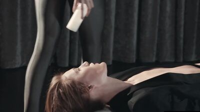 Gorgeous redhead fucks her girlfriend with strapless dildo