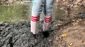 White socks in dump, white socks in swamp, muddy white socks, dirty socks