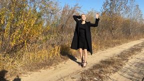 girl began to crush the can with her heels and did not notice how glue flowed out of it, which made her feet stick to the road