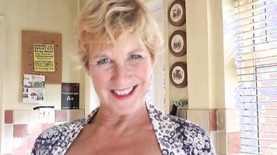 Short-haired mature woman is being naughty in this POV video