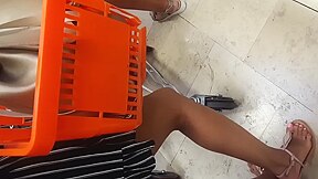 Public Candid Feet And Legs With Sandals At Supermarket (with A Little