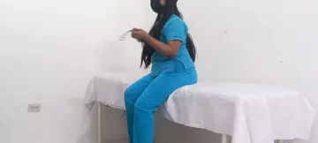 My nurse massages her pussy and moans with pleasure in her office