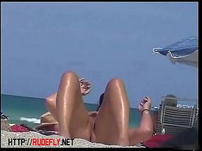 A girl from nude beach shows her butt and pussy