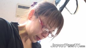 This Asian lady pees in her pants in front of her coworkers