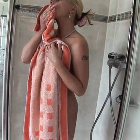 Horny German MILF gets hot while showering and immediately makes a hot cam session!