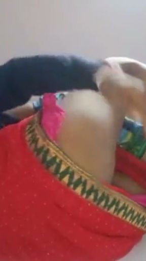 Desi aunty in red saree lifted her legs and   Clip 1