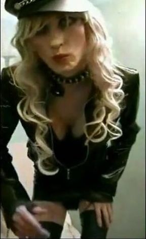 Sissy Sandracduk posing in leather outfit