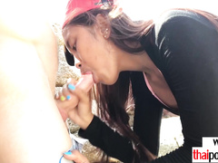 Amateur Thai young Cherry sucking a big white shaft at the beach outdoor