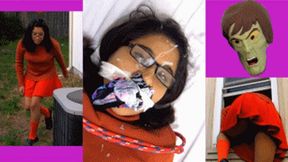 Velma gets a nasty facial from the Creeper