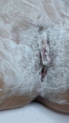 Extreme close-up of hairy pussy shaving!   Clip 2