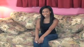 Seductive Ebony Babe Strips Naked on Couch Teasing Pussy