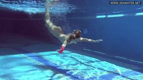 Mary Kalisy: Stunning Brunette in Red Lingerie Makes Waves in the Pool