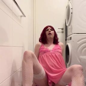 Sissy in pink lingerie plays with her fuckhole