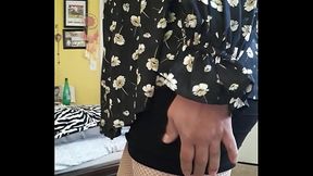 Usando ropita de mujer