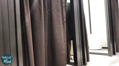 British MILF flashes in Zara changing room while fingering herself