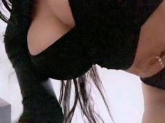 Big boobed Memphis masturbates in a bodystocking