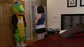 Horny black stripper in big toy mask gets BJ from busty pale brunette