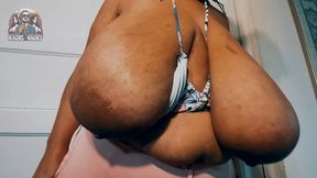 Huge Black Boobs in a Bikini Top