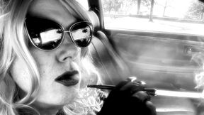 MRS. ROMAN CAR SMOKING A VS100 MENTHOL IN A SEXY CIGARETTE HOLDER