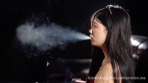 Asian Beauty Deep Inhales Cigarette Smoke and Blows Thick Clouds in Red Velvet Dress HD