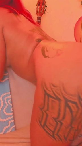 A Latina with a Tattooed Body Is Shaking Her Butt for You