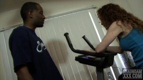 black dick in her ass makes her peddle faster