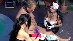 Dominatrix nails his balls to a plank and controls his orgasm
