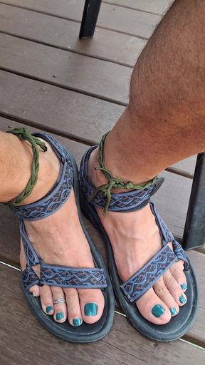 Kneel down in front of me and jerk your cock to my feet in sandals and toe rings