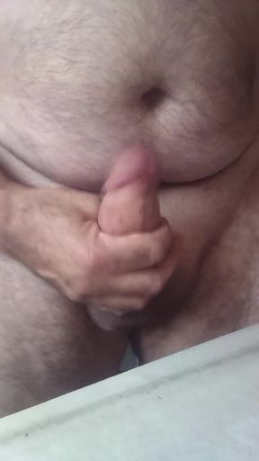 Handsome mature chubby with big fat masturbating and cumming in close-up
