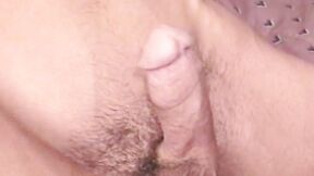 Hung guy tugs his hard unshaved prick until spraying a big load
