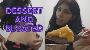 Eating dessert and showing bloated belly