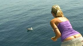 Obedient housewife Sandy takes a sun bath on the boat topless