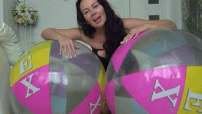 I deflated two large beach balls in different ways d