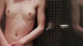 ”Watch this charming redhead pee before fucking herself with her dildo”