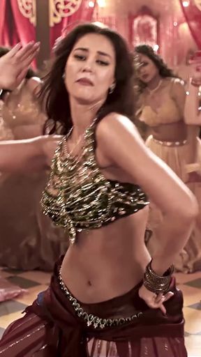 Indian dancer shows off her moves in a spicy lap dance