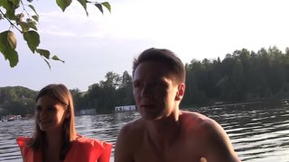 Seductive temptress is giving a blow job on the boat to a guy