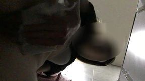 Piss from a hairy cunt in a public toilet