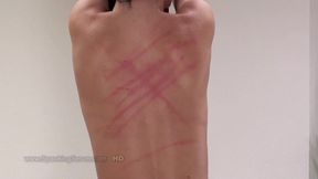 Eileen Sue bare back whipping by a naughty domina