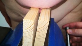 Nipple squeezing in a vice