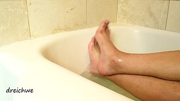 Feet in hot water in a jacuzzi
