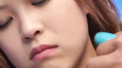 Japanese babe goes hard solo with magic wand in close up POV