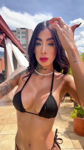 Tati Cruz showcases her stunning figure in a black bikini